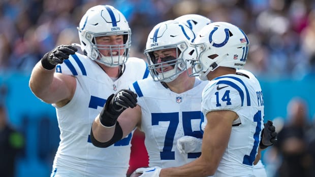The Indianapolis Colts celebrate a touchdown by wide receiver Alec Pierce (14), right, on Sunday, Dec. 3, 2023, during a game against the Tennessee Titans at Nissan Stadium in Nashville, Tenn.  